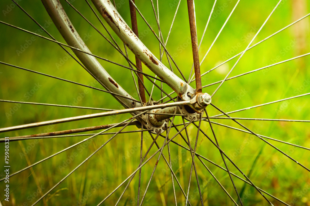 old bicycle wheel vintage background