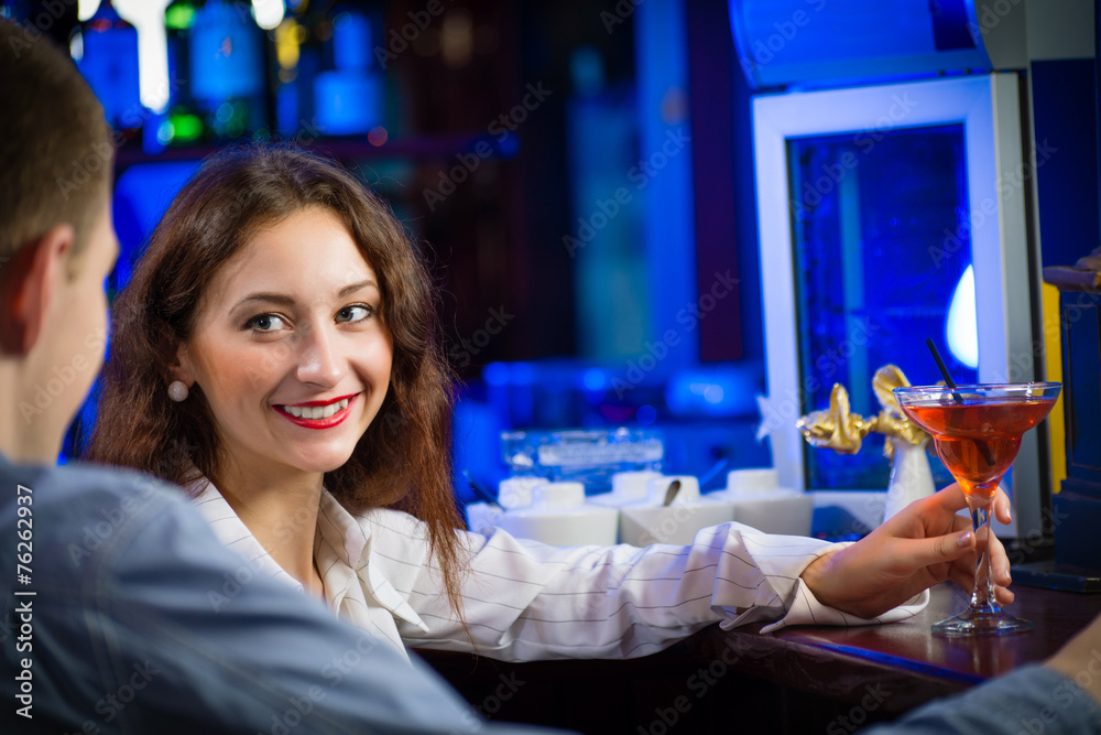 young woman in a bar