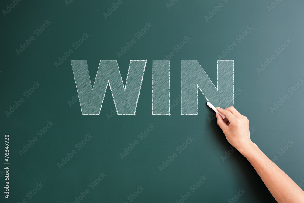 win written on blackboard