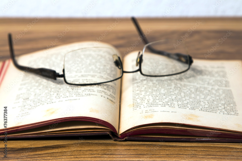 Old book and glasses