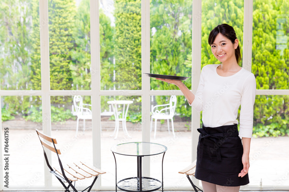 young asian waitress in the cafe