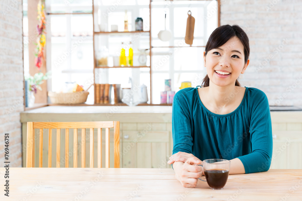 young asian woman in the kitchen