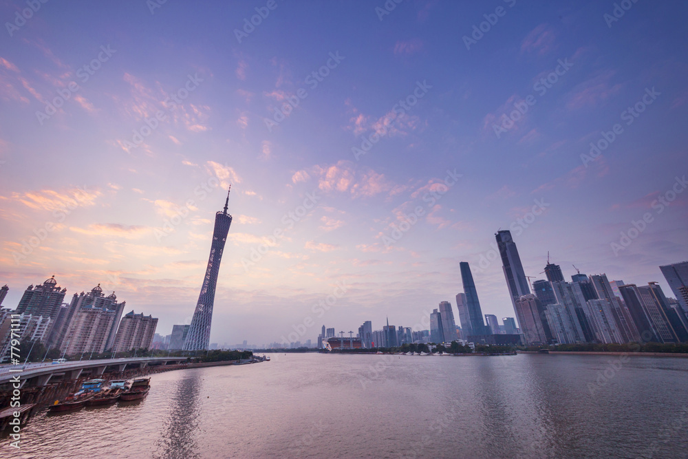 skyline and cityscape of modern city guangzhou during sunset at