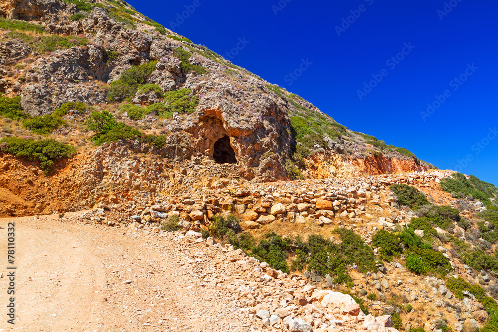 Rocky coast of Crete with country road, Greece