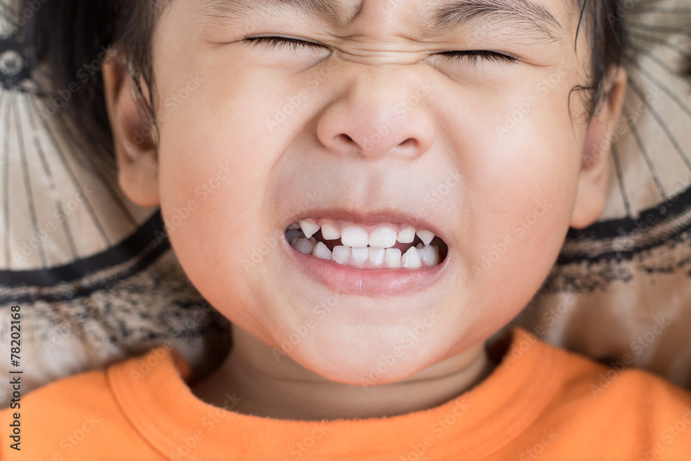 close up funny face of children toothy acting