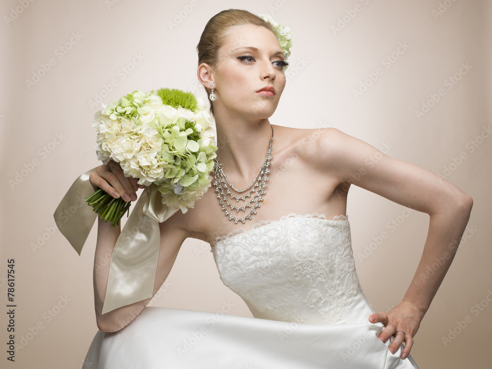 Model posing in wedding dress