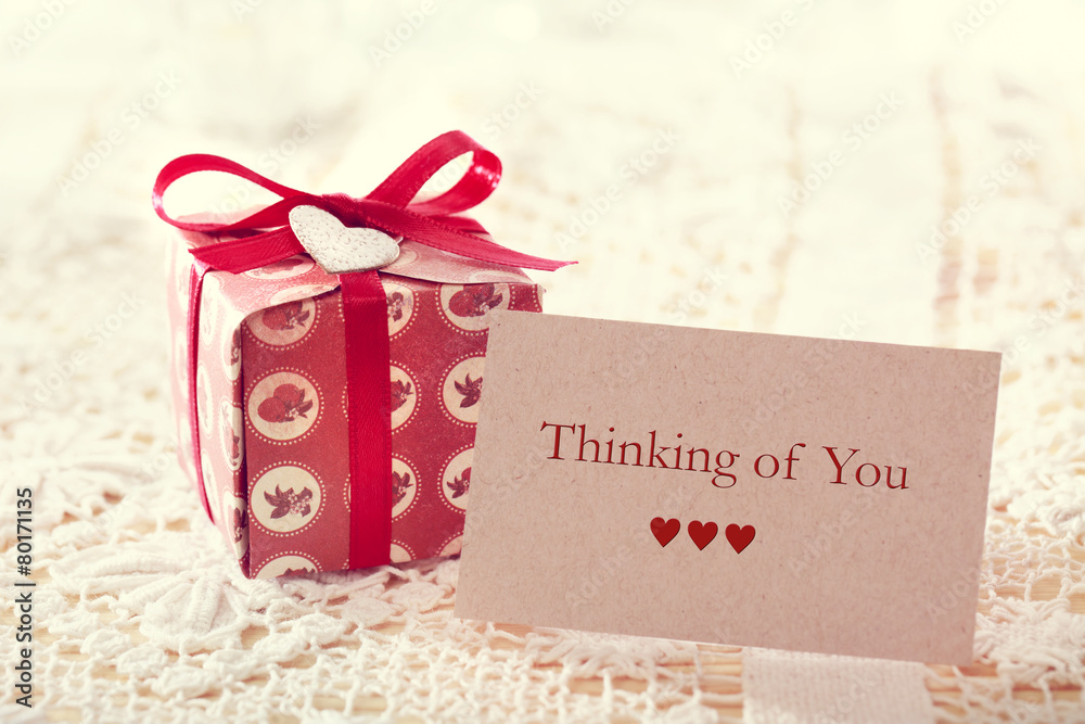 Thinking of you message with red present box