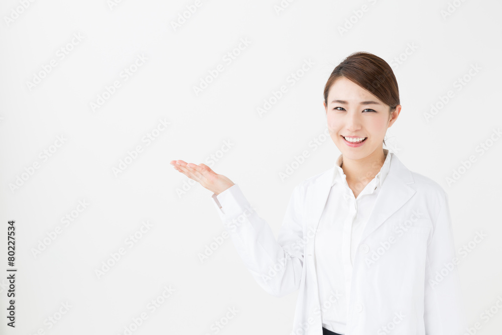 young asian doctor on white background