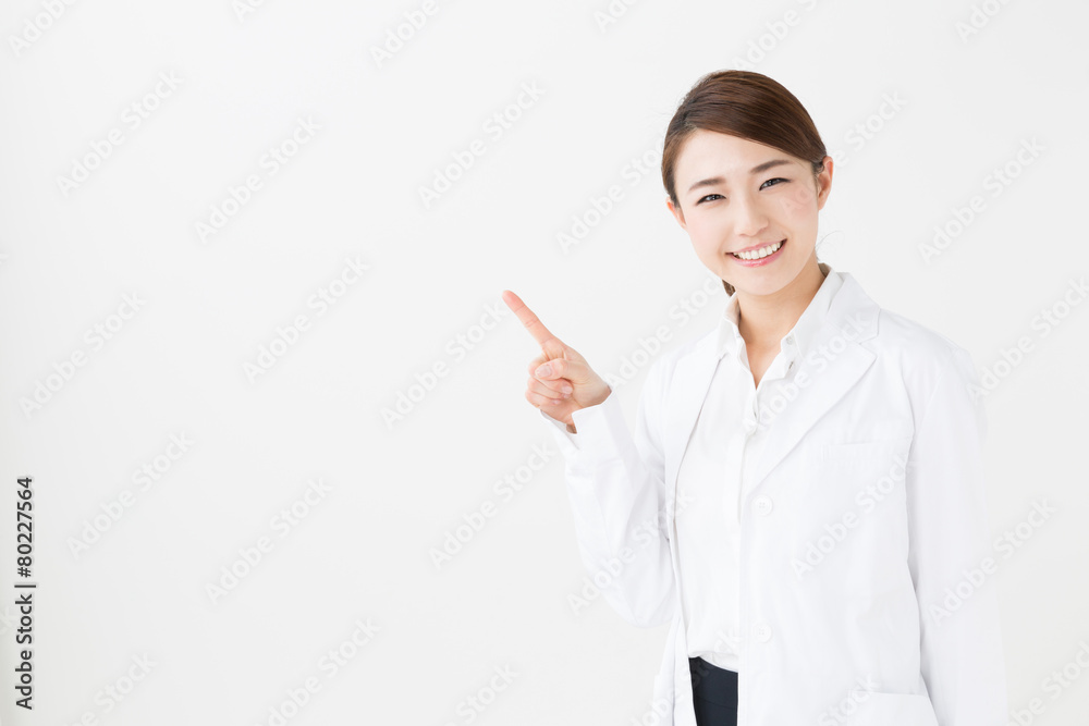 young asian doctor on white background