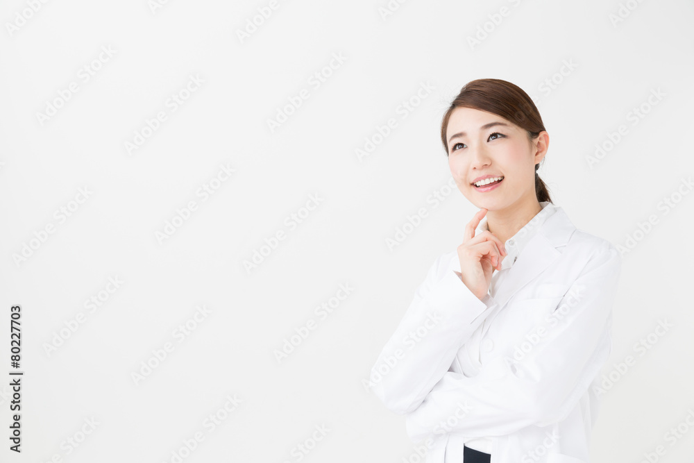 young asian doctor on white background