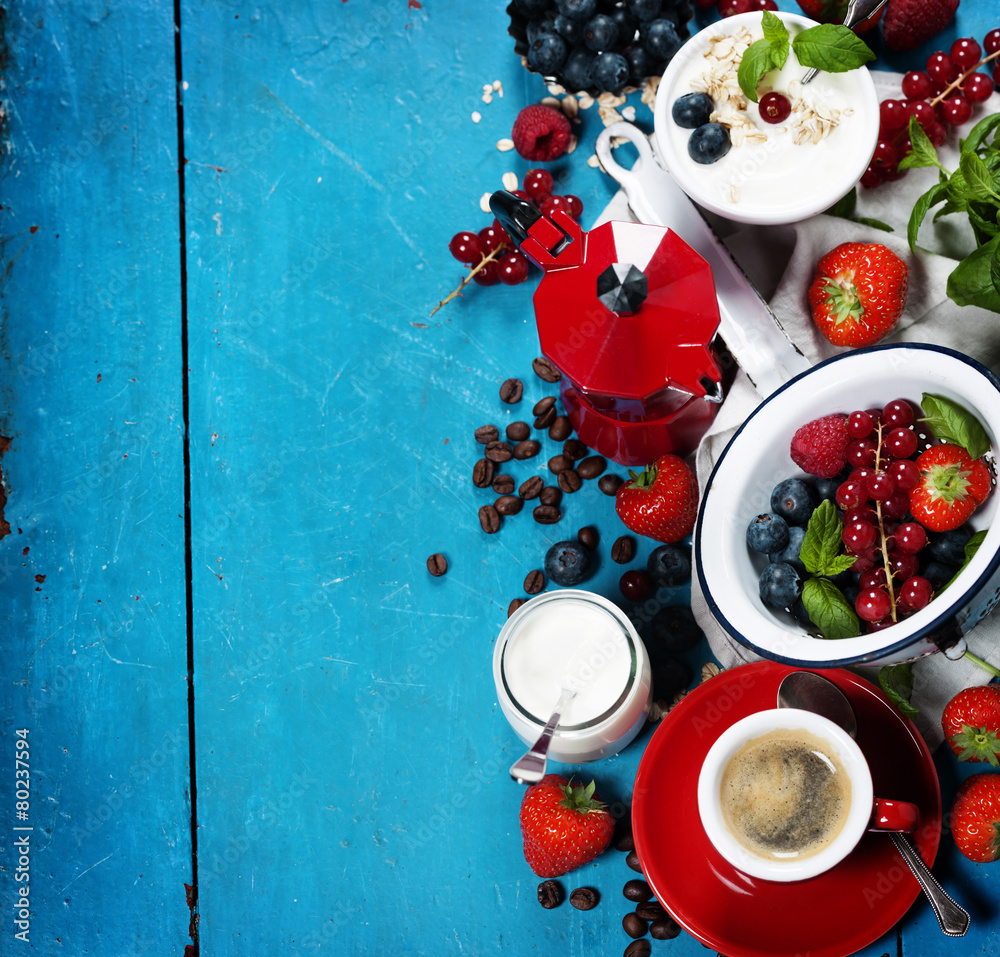 Healthy breakfast - yogurt with muesli and berries - health and