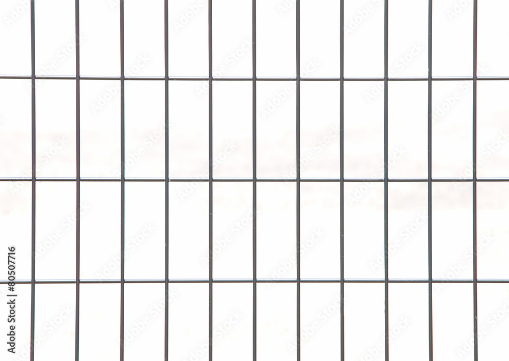 Wire mesh fence isolated on a white background .