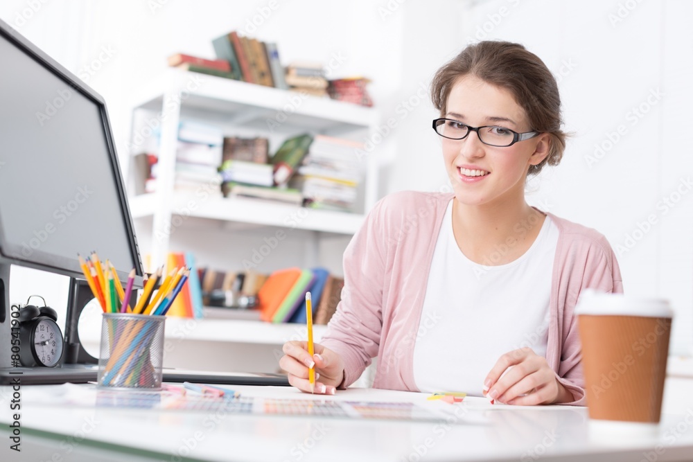 Designer. Portrait of a young graphic designer sketching at home