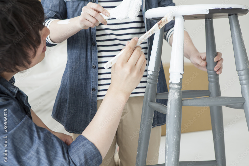 Couple is enjoying the color-painted chair