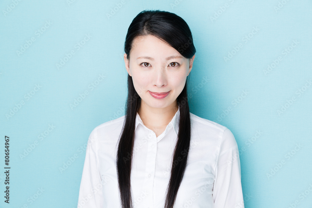 asian businesswoman on blue background