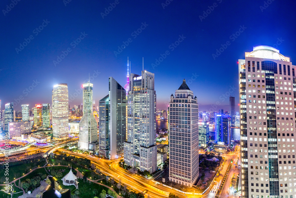 urban skyline and illuminated skyscrapers