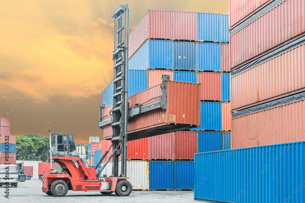 Crane lifter handling container box loading to depot