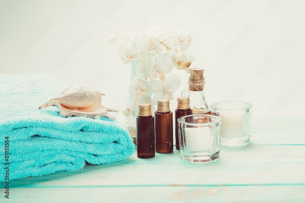 Spa. Spa and wellness setting with flowers, candles and towel