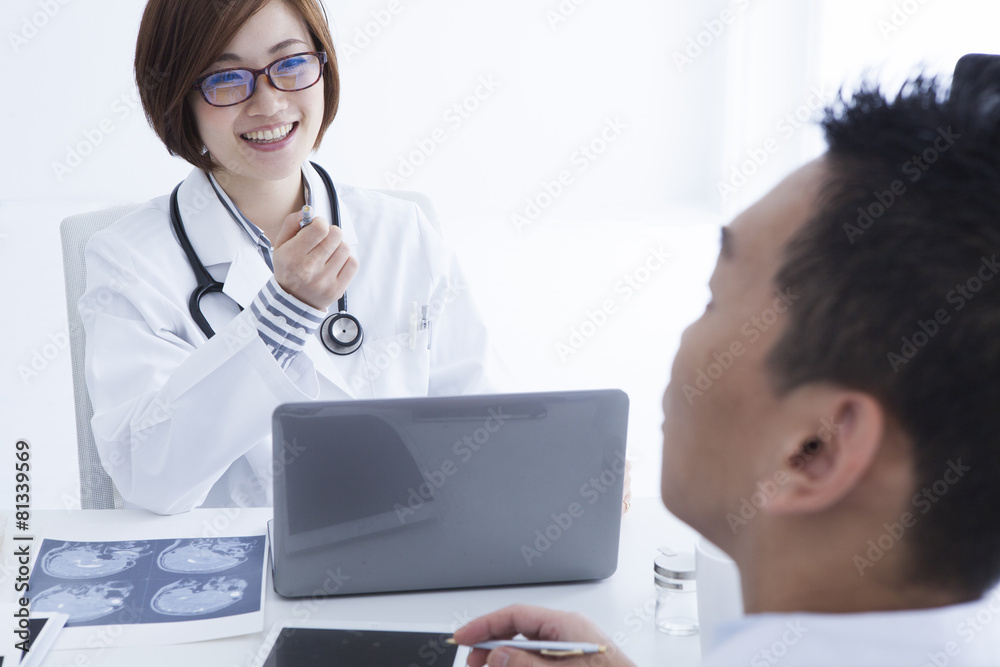 Woman doctor talking with a smile