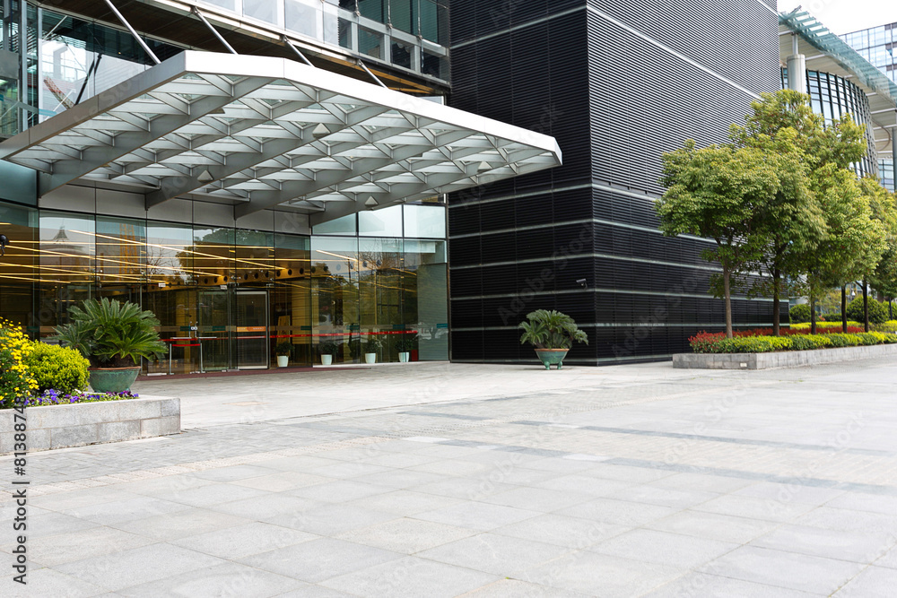 Empty road in front of building entrance