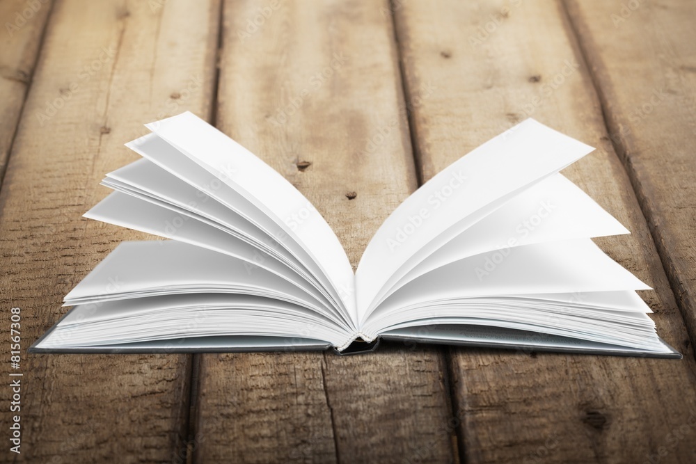 Book. Open book isolated on white and letters flying away