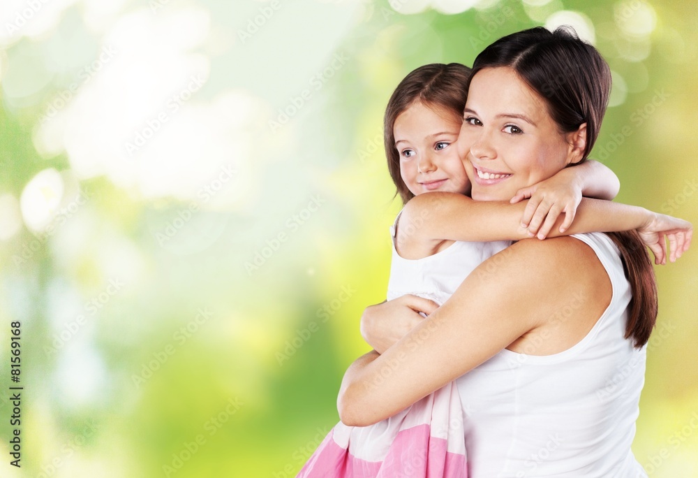 8. Mother and daughter look at each other - portrait on isolated