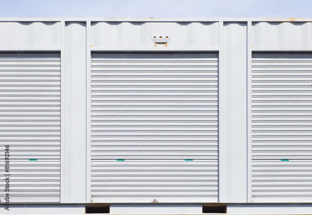 Exterior of white storage unit or small warehouse for rental