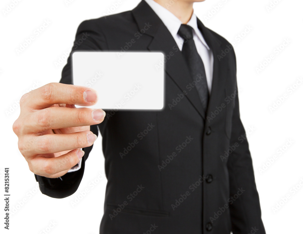 Businessman holding paper or visit card isolated on white backgr