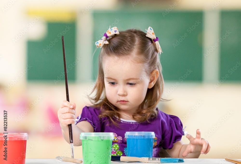 Child. Happy child with painted hands