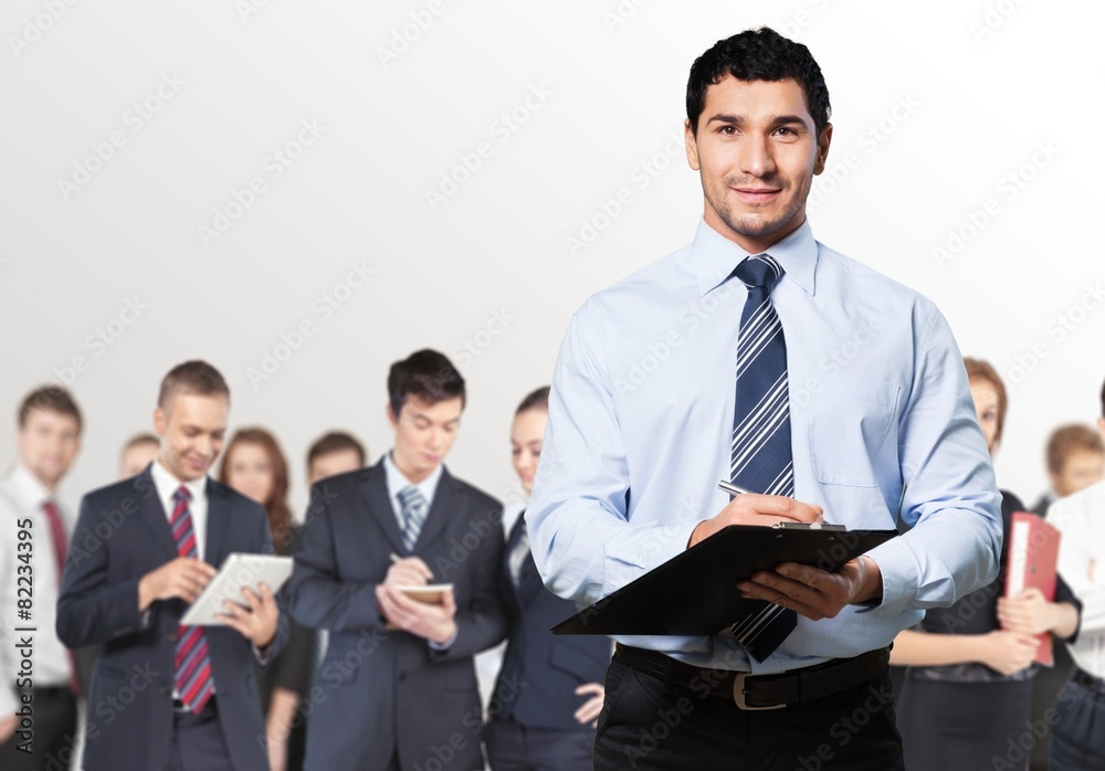 Business. Portrait Of Manager In Warehouse With Clipboard