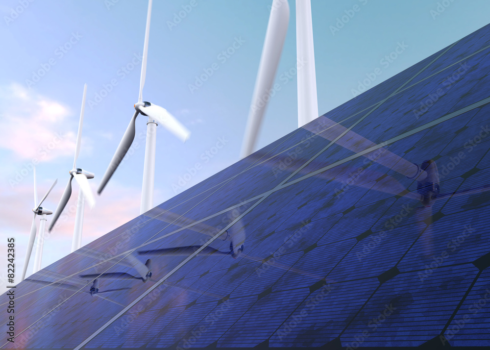 Solar panels and wind generators against blue sky