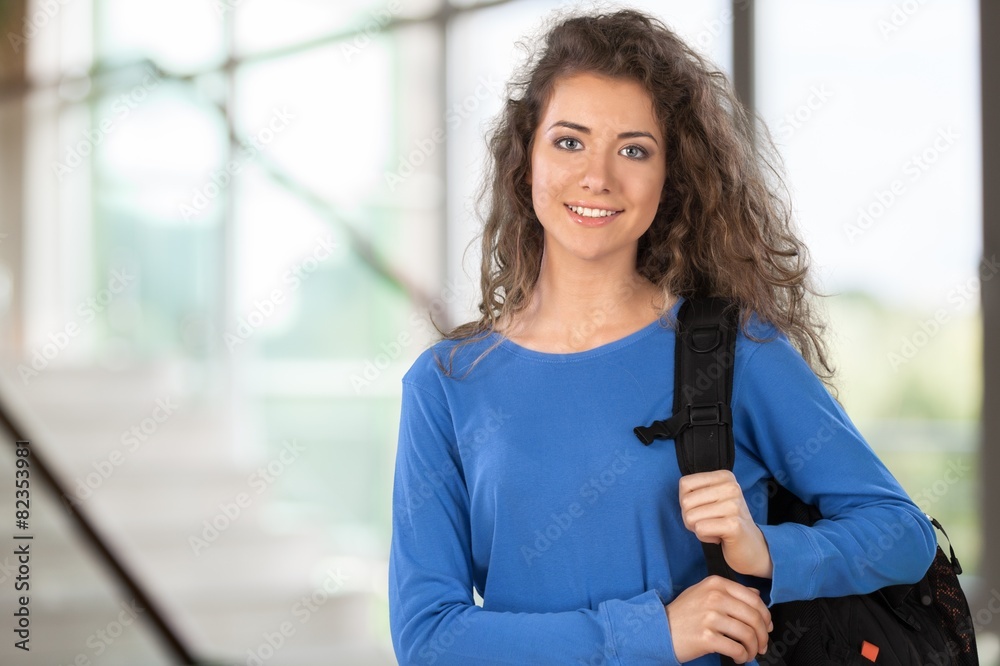 Student. Student on Campus with Backback