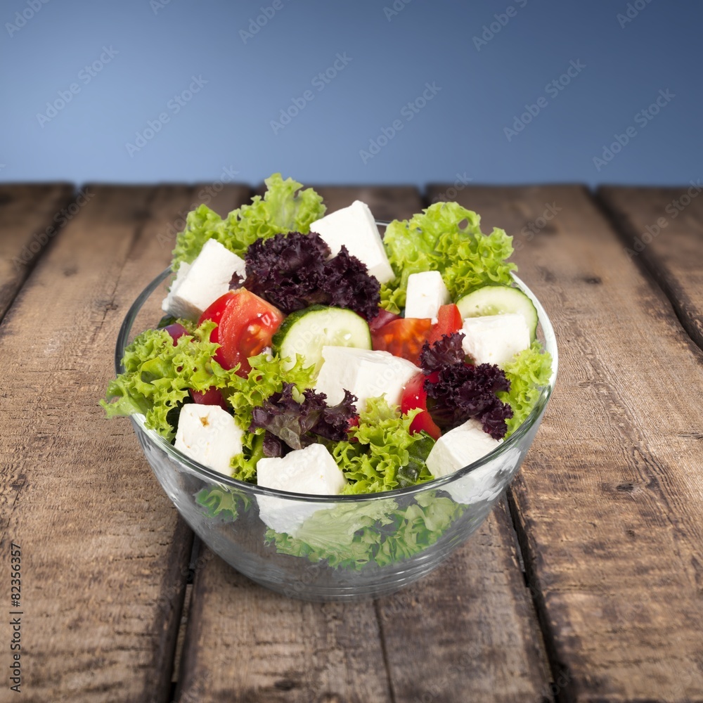 Salad. Vegetable salad bowl isolated on white