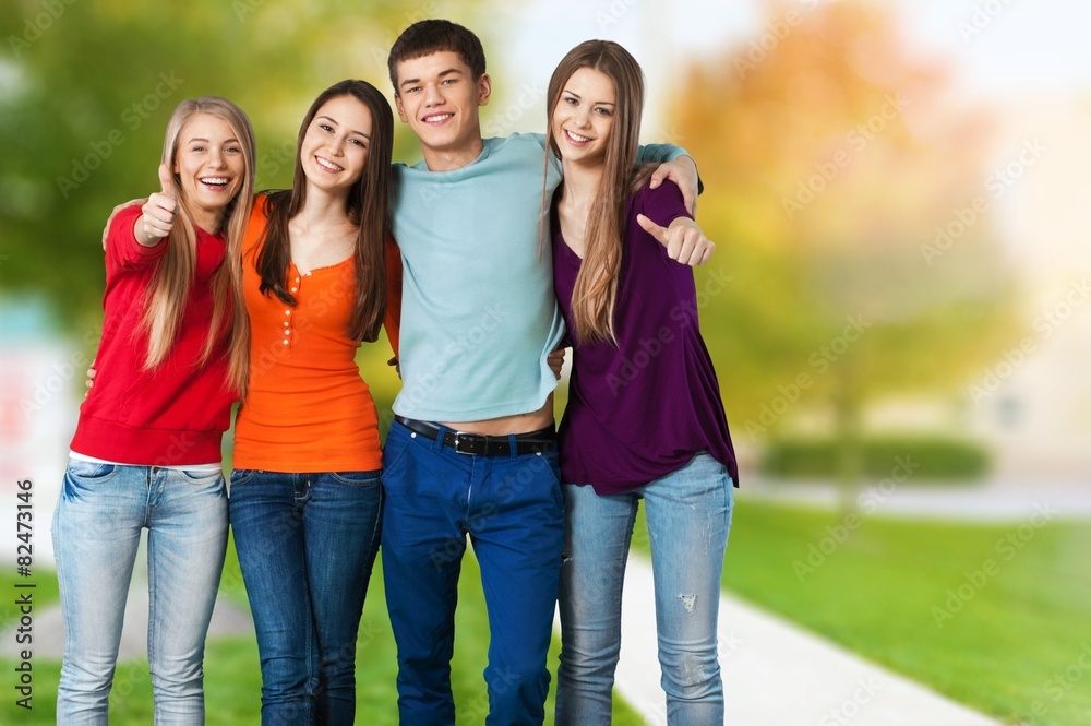 Teenager. Four College Students Celebrating on White