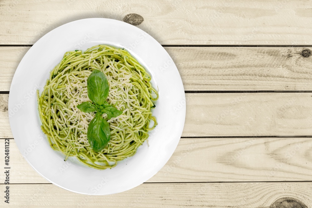 Pasta. Italian pasta spaghetti with pesto sauce and basil leaf