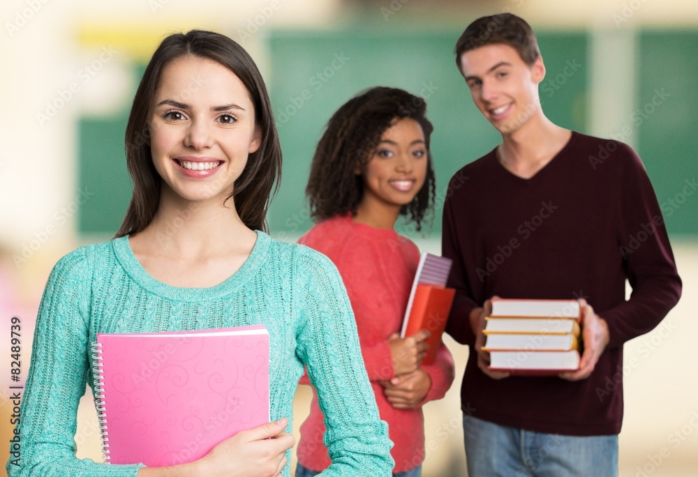 Learn. Group of college students at the library