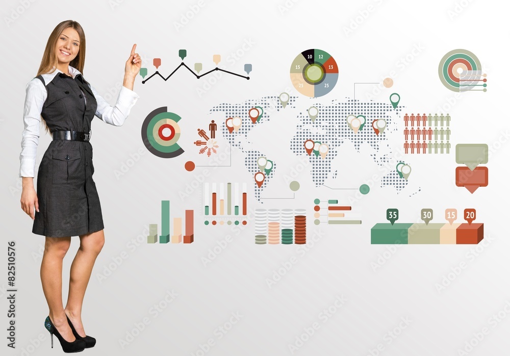 Abstract. Beautiful businesswoman pointing at big 3d chart