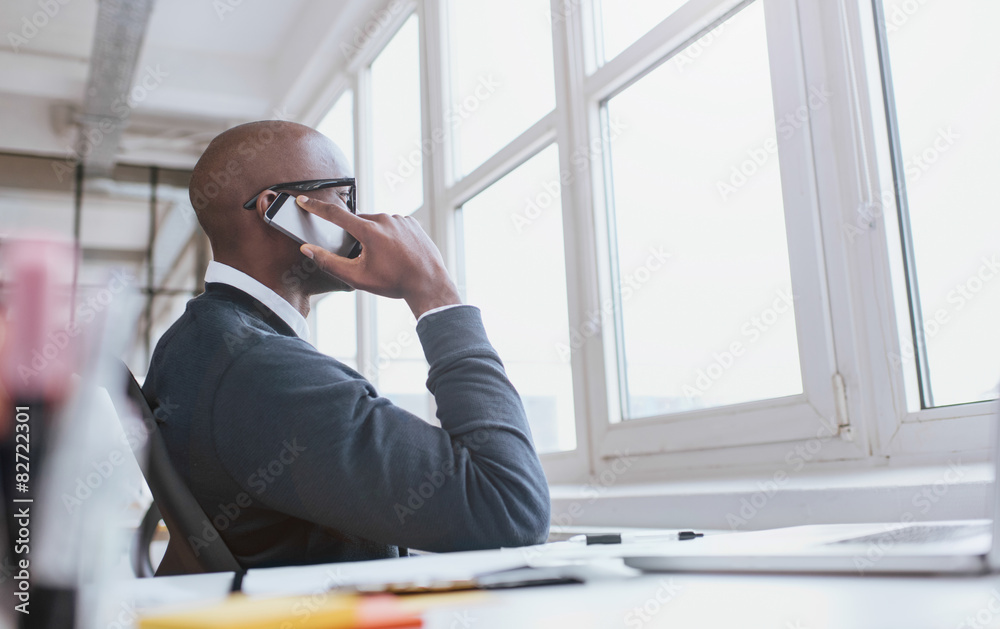 Executive on phone while at work