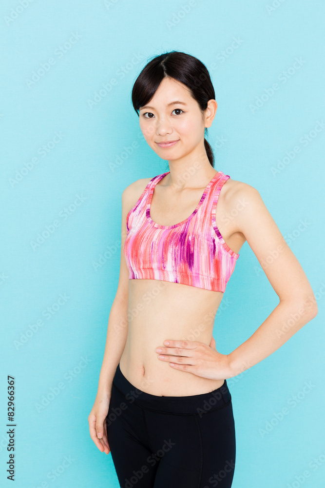 attractive asian woman on blue background