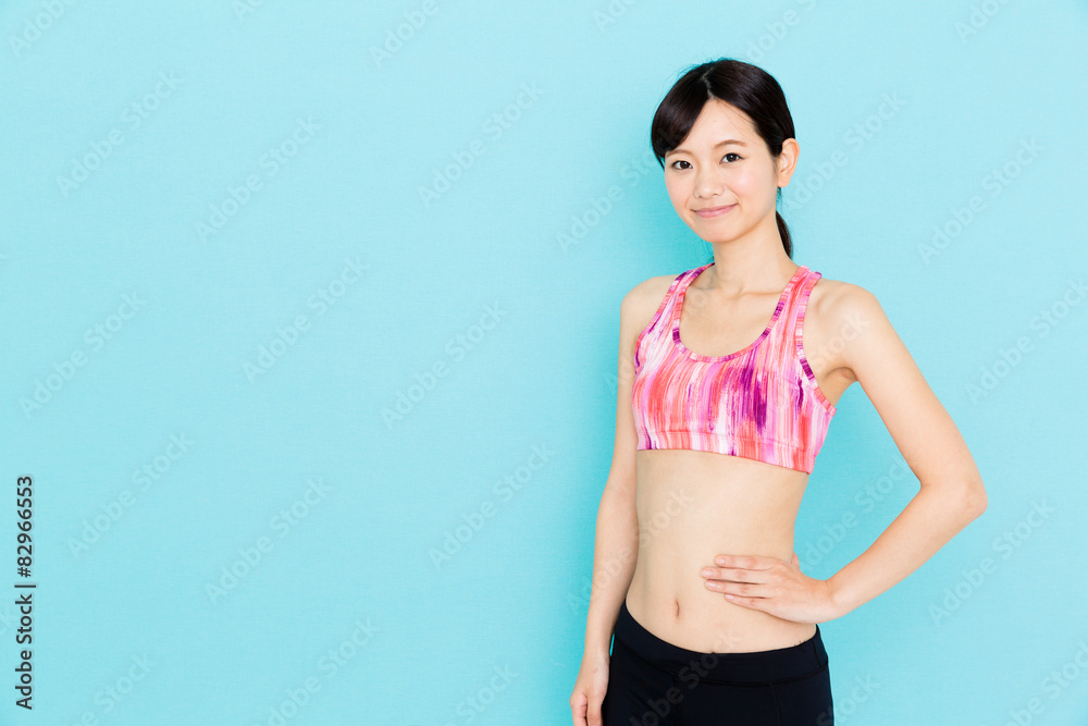 attractive asian woman on blue background