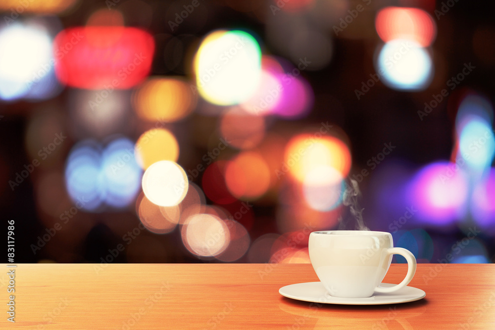 cup of coffee on a wooden table in a cafe