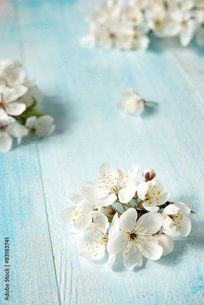 Cherry flowers on wooden board