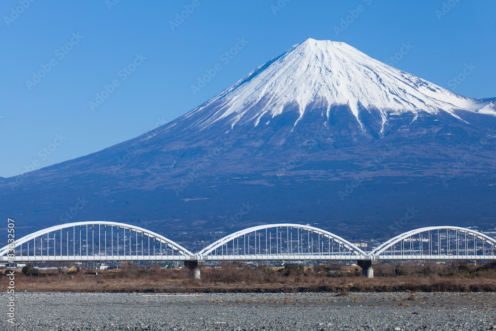 Mountain Fuji and railway in winter season from Shizuoka 