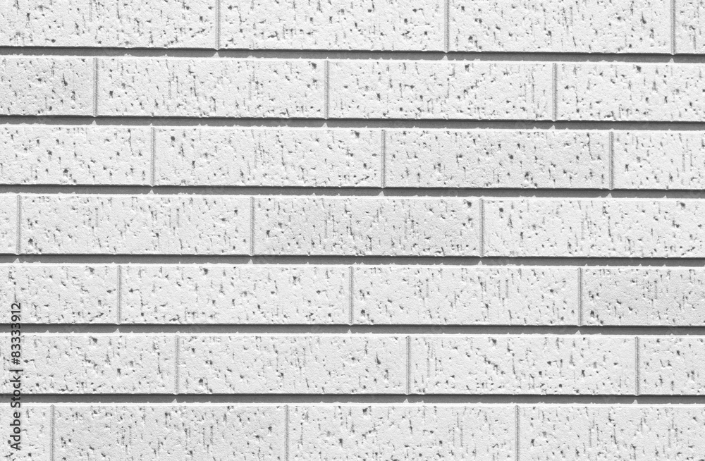 The modern white concrete tile wall background