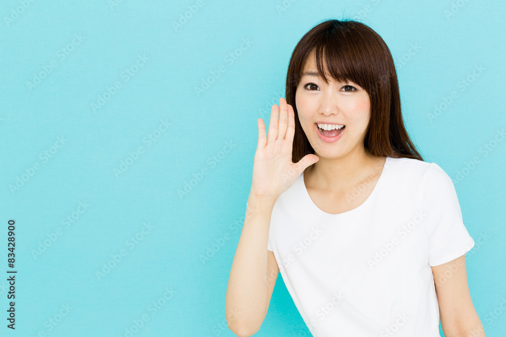 attractive asian nurse on blue background