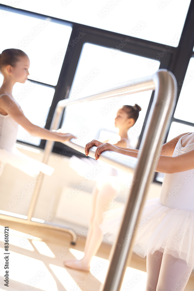 Little Ballerinas Holding Ballet Bar in a Training