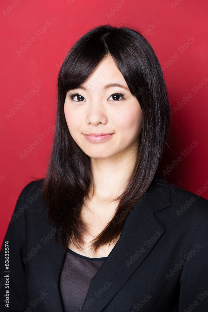 asian businesswoman on red background 