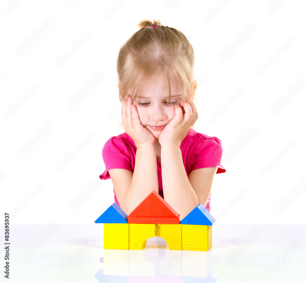 Little Girl Plays Block Isolated on White Background