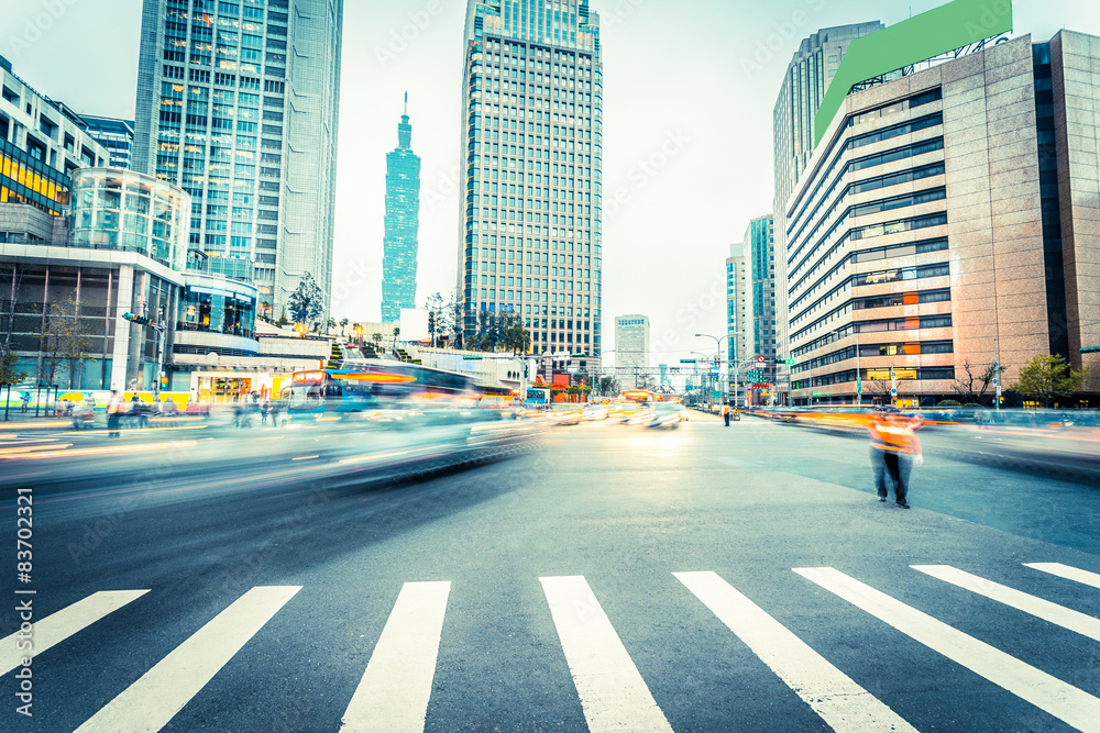 traffic blurred motion and office buildings