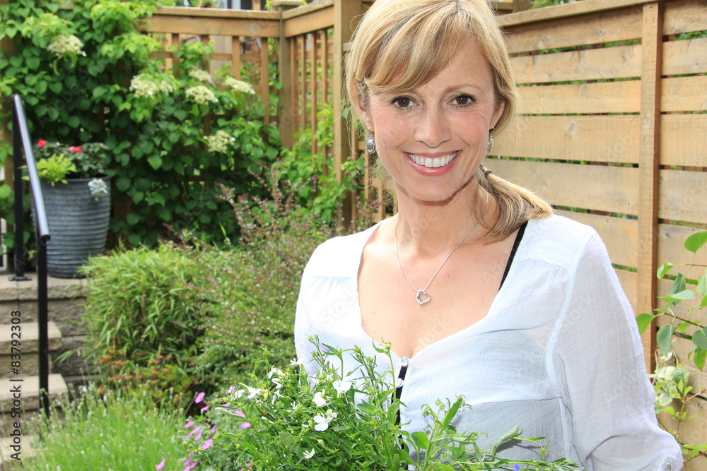 Lady gardener in the garden..